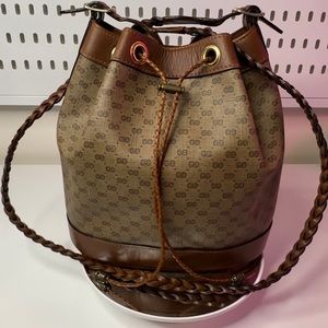 Vintage GUCCI bucket bag with original braided shoulder strap.